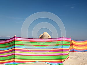 Female sunbather at the beach photo