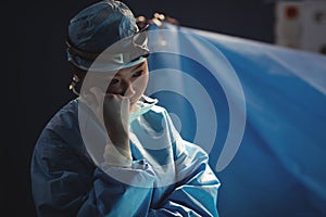 Female surgeon in operation room