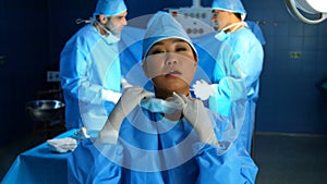 Female surgeon in operation room