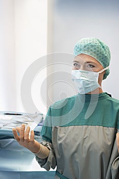 Female surgeon in scrubs at hospital