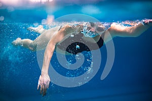 Female swimmer in an indoor swimming pool