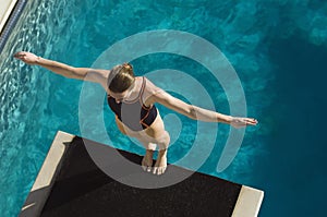 Female Swimmer Ready To Dive