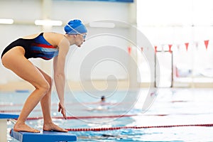 Female Swimmer on Start