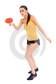 Female tabne tennis player ready to serve
