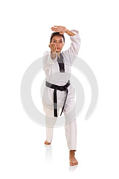 Female taekwondo athlete with thrusting hand strike stance