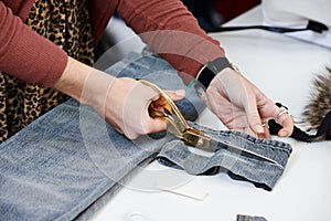 Female tailor hands at work