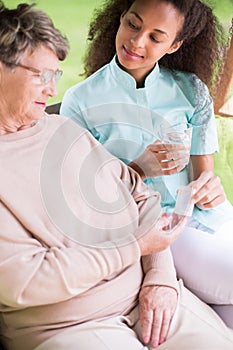 Female taking medicines