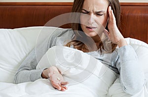 Female taking painkillers