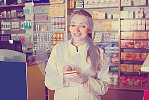 Female technician in chemist shop