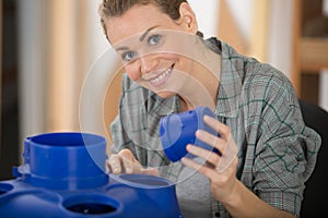 female technician fixing box