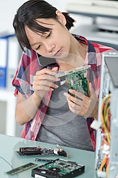 female technician on phone photo