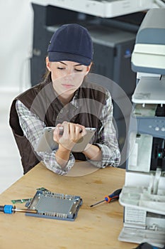 Female technician using tablet computer