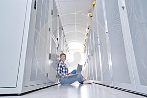 Female technician working on server maintenance