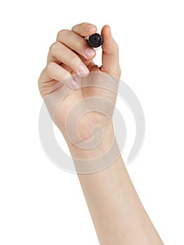 Female teen hand to write sommething with black marker