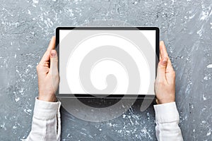 female teen hands using tablet pc with white screen, Mockup image of woman hand holding white tablet pc with blank white