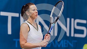 Female Tennis Player Holding the Racquet During Championship Match, Jumping Warmup, Ready to Receive