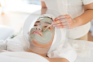 A female therapist doing Facial Spa/Treatment Add moisture to th