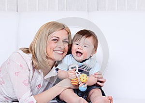 Female and toddler laughing