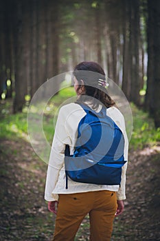 Female tourist with blue backpack