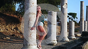 Female tourist in colonnaded street in Side, Turkey