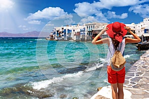 Female tourist on Mykonos island, Cyclades, Greece, on her summer vacation trip