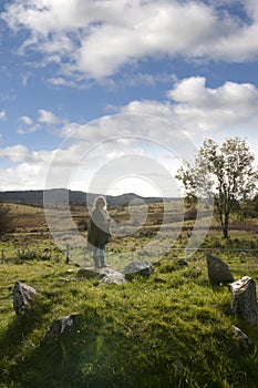 Female tourist at a stone circle in county Donegal