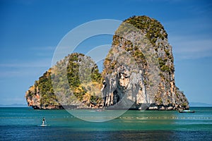 Female tourist surfboard at Phra Nang beach, Krabi