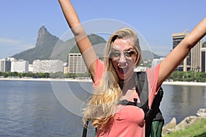 Female tourist traveling at Rio de Janeiro with Christ Redeemer.