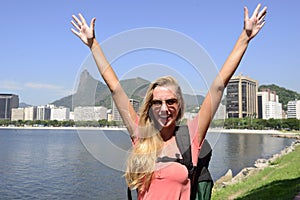 Female tourist traveling at Rio de Janeiro with Christ Redeemer.