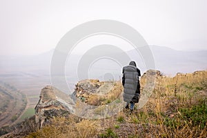 Female Tourist walking around fortress