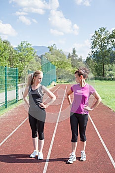 Female Track Competitors Glaring at Each Other