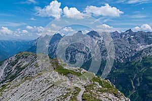 Female trailrunning in the mountains of Allgau near Oberstdorf, Germany