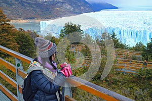 Female Traveler Looking at the Massive Glacier of Perito Moreno, an Amazing UNESCO World Heritage Site in Patagonia, Argentina