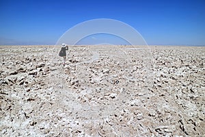 Female Traveler Taking Photos on the Trail of Salar de Atacama, Extensive Chilean Salt Flat at the Altitude of 2,305 M.