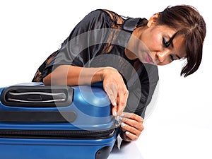 female traveller with carry-on