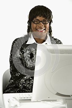 Female typing on computer