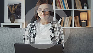 Female using laptop diverting herself