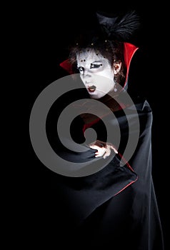 Female vampire showing fangs