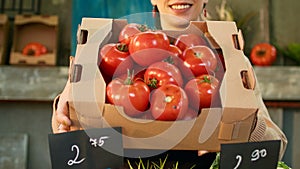 Female vendor stand holder at local marketplace