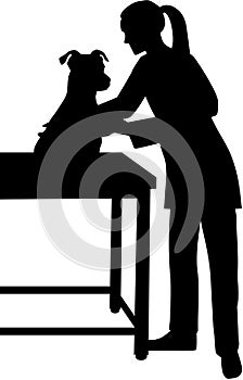 Female Veterinarian with dog silhouette photo