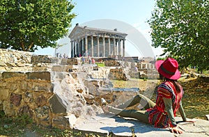 Female Visitor Enjoying Impressive View of the Ancient Garni Pagan Temple, Armenia