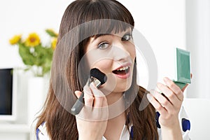 Female Vlogger Presenting Make Up Tutorial Video photo