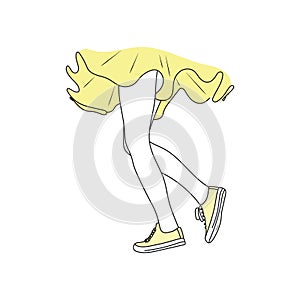 Female walking legs in yellow shoes