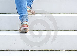 Female walking upstairs