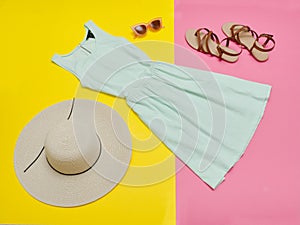 Female wardrobe. Mint dress, handbag, shoes and a hat. Bright pi