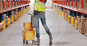 Female warehouse worker moping floor