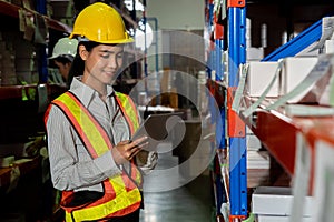 Female warehouse worker working at the storehouse