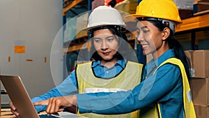 Female warehouse worker working at the storehouse