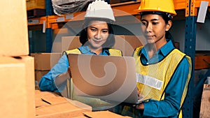 Female warehouse worker working at the storehouse