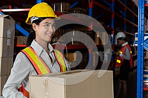 Female warehouse worker working at the storehouse